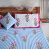 "Soft blue bedsheet for a peaceful, comfortable bedroom"