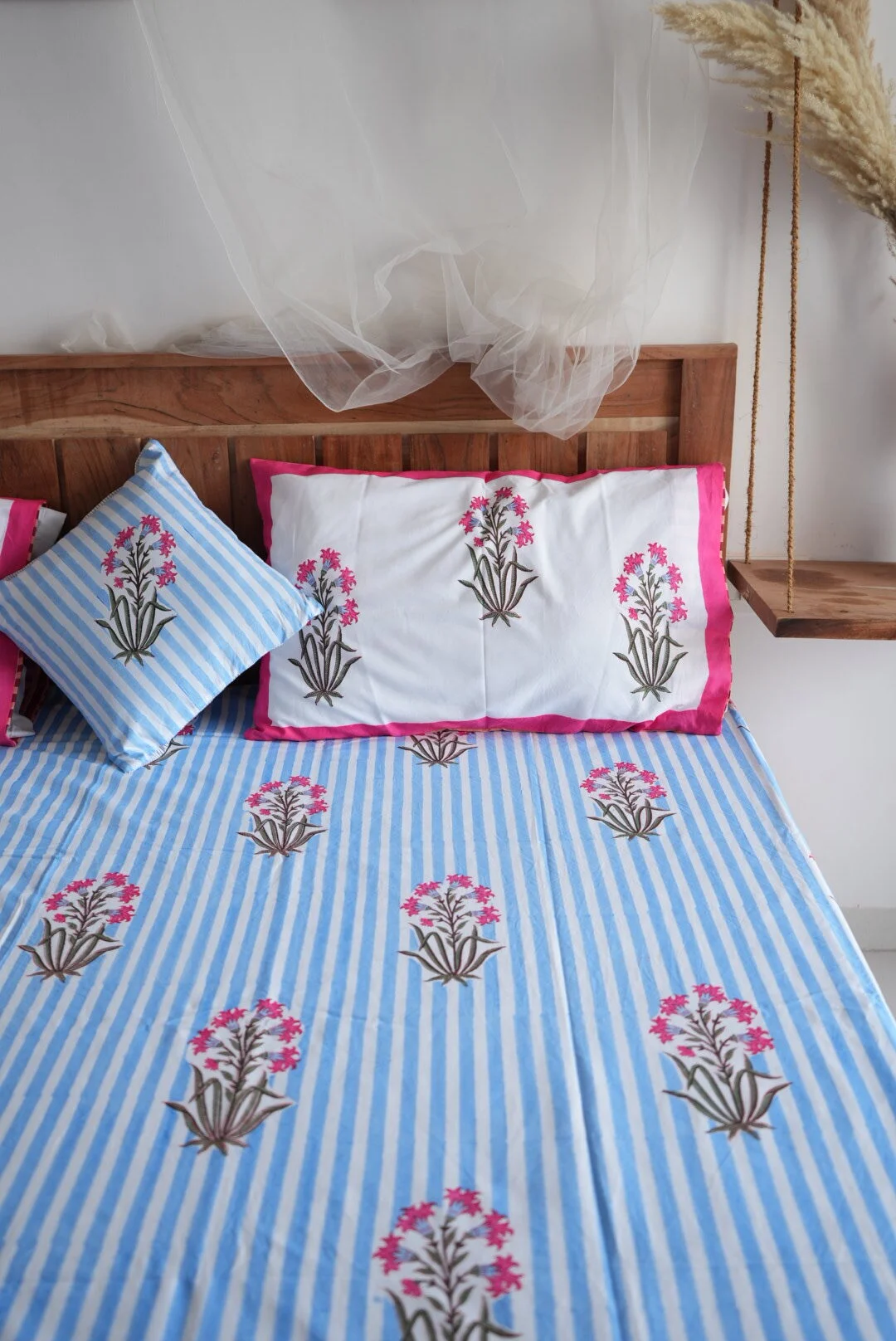 "Soft blue bedsheet for a peaceful, comfortable bedroom"