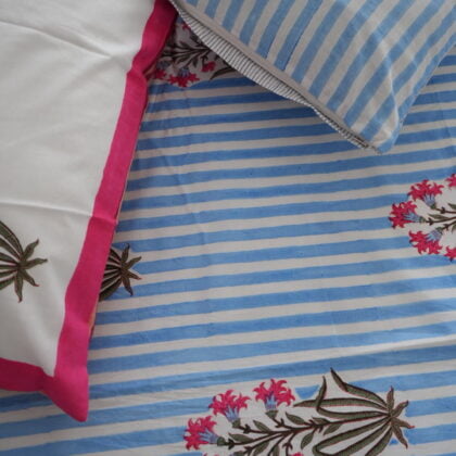 "Soft blue bedsheet for a peaceful, comfortable bedroom"