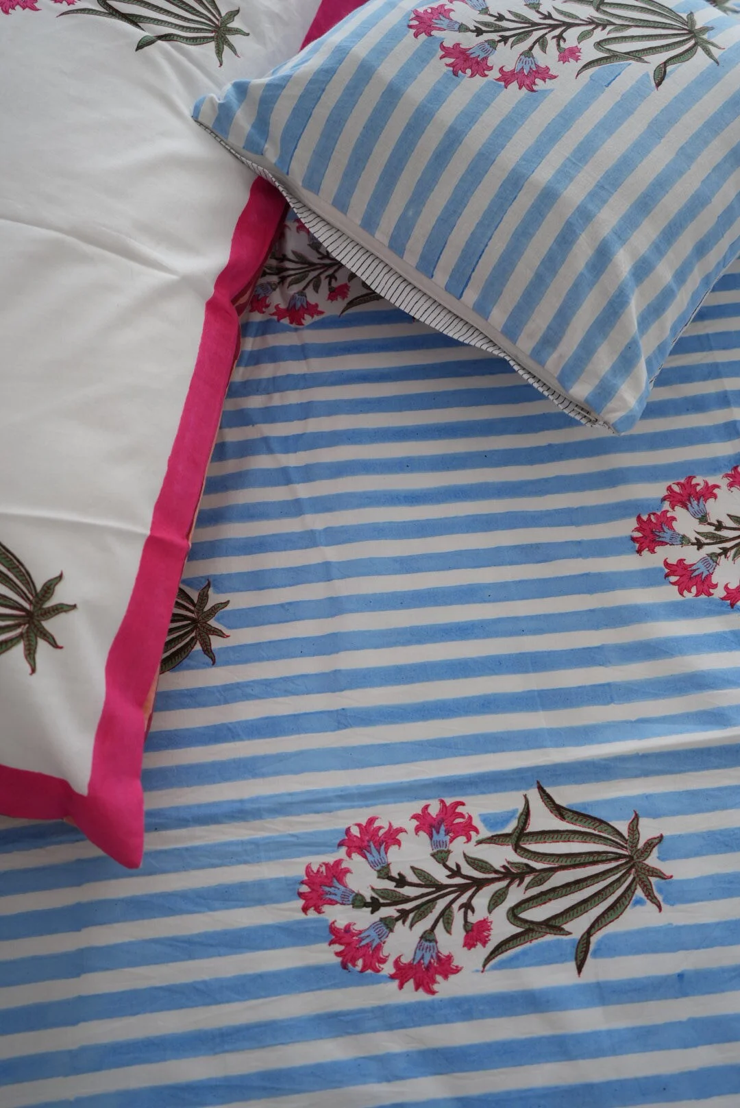 "Soft blue bedsheet for a peaceful, comfortable bedroom"